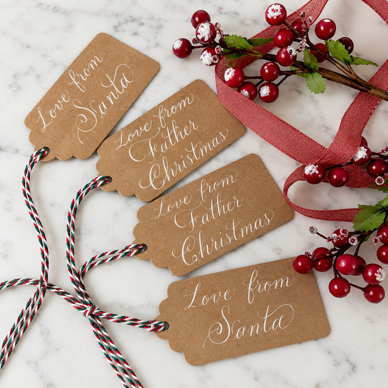 Christmas kraft gift tags handwritten in white calligraphy